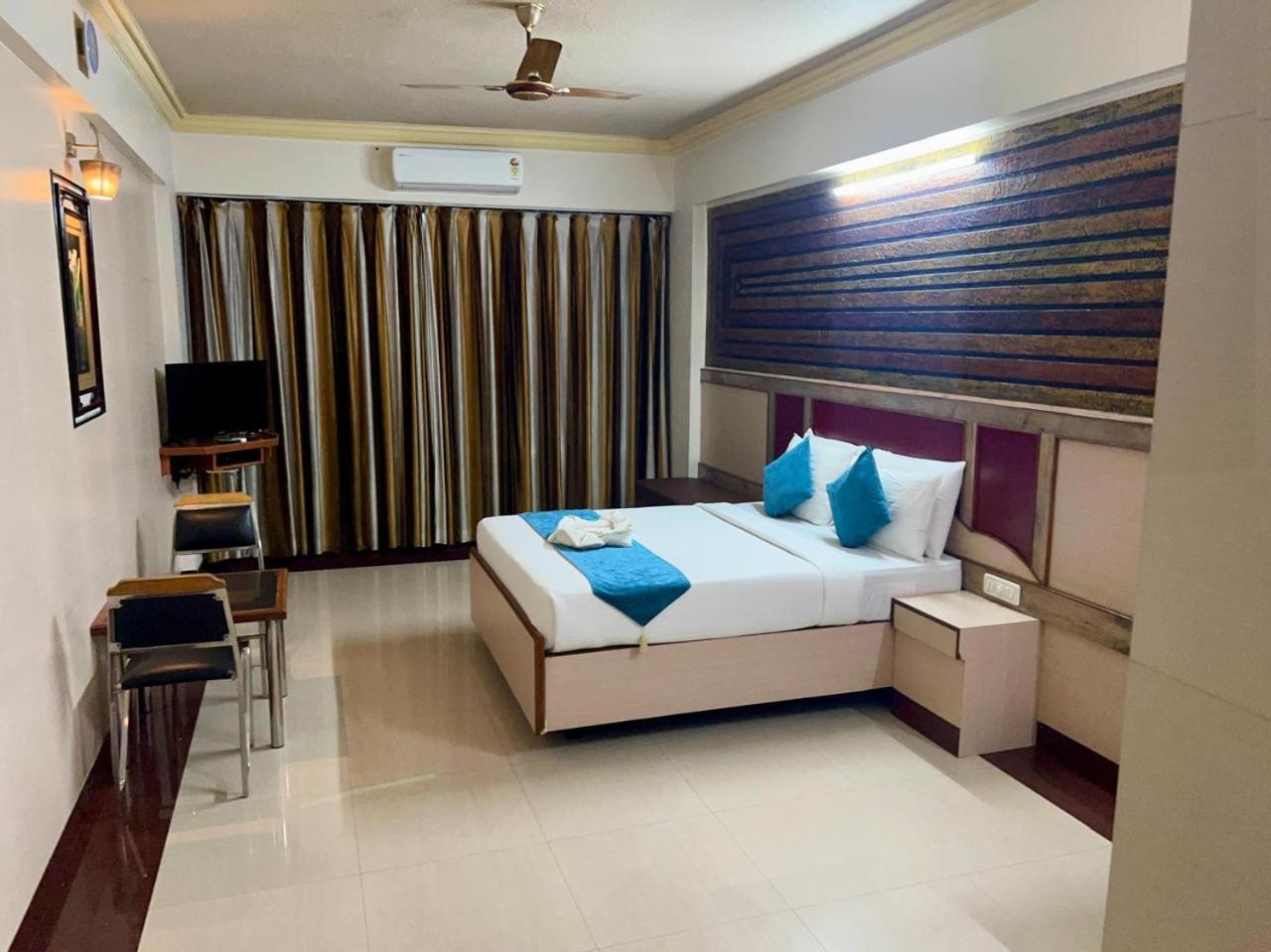 The Grand Krishna Rooms Бангалор Экстерьер фото